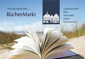 Aufgeschlagenes Buch in den Dünen, Büchermarkt